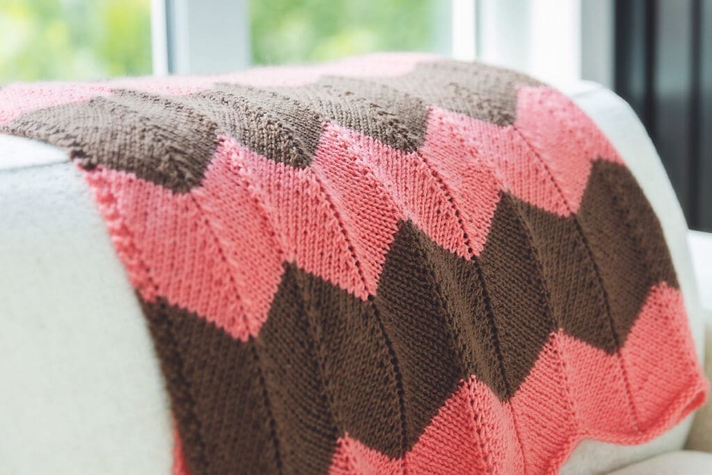 Knit Chevron Blanket on Couch for free pattern